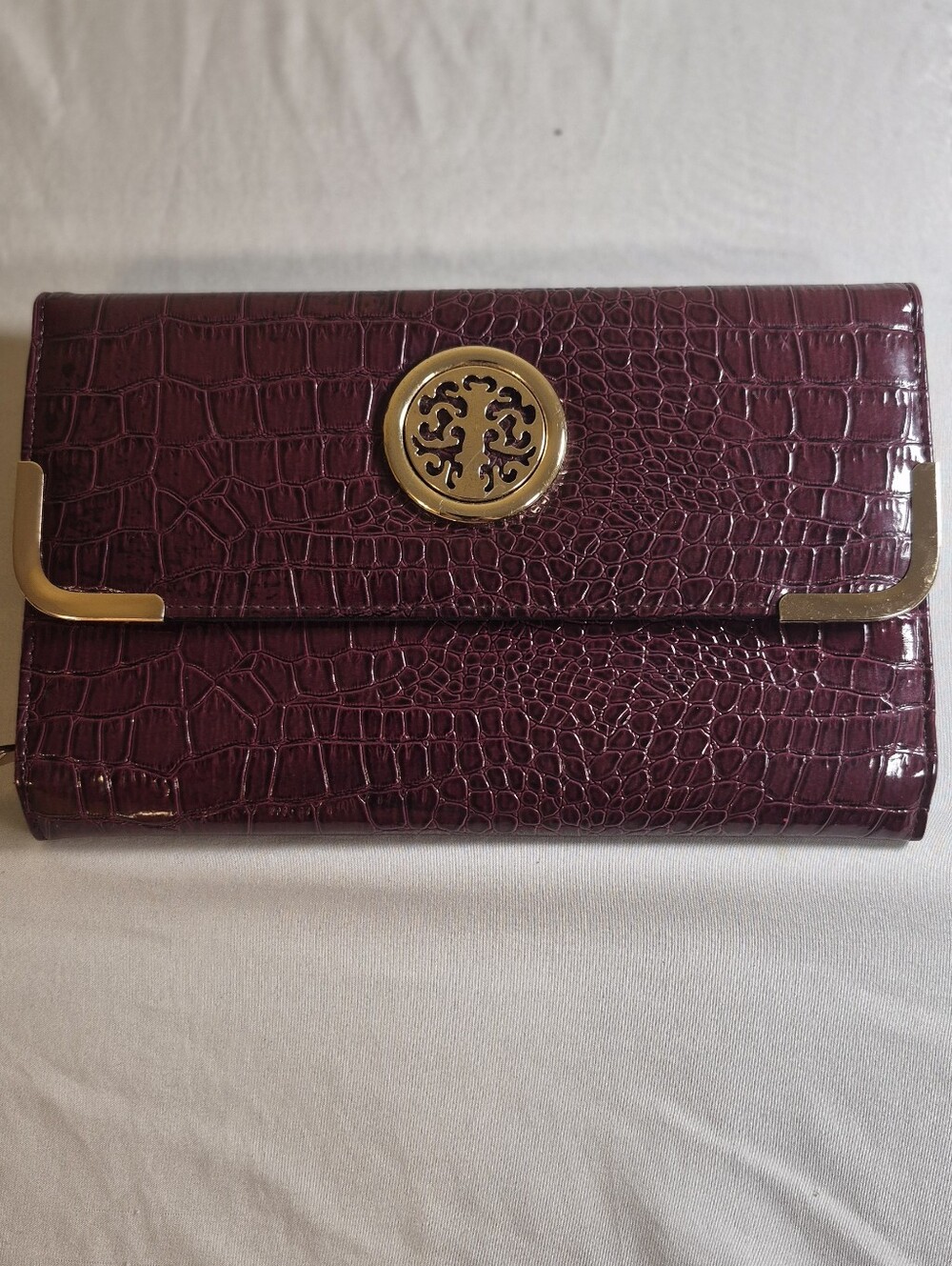 Designer-Inspired Croc-Embossed Burgundy Clutch with Gold Medallion